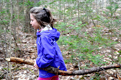 A second grader at GSB school works on a trail.