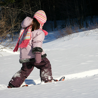 girl snowshoeing