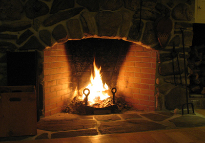 fire in a stone fireplace