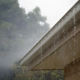 rain in a gutter on a house