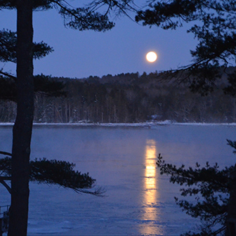 Full moon over an icy Damariscotta River