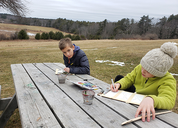 kids painting outdoors