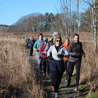 Runners on the trail during the 2022 Foodbank Farm 5K
