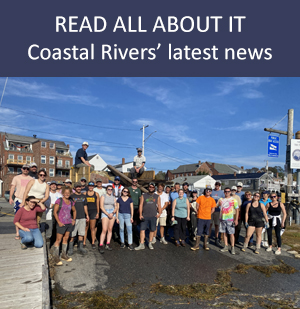 River Clean-up volunteers lined up at the town landing