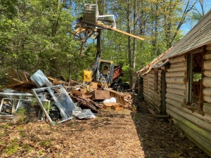 Removing the abandoned cabin at Keyes Woods